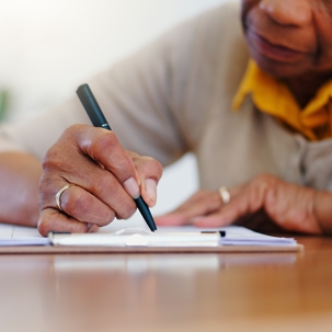 man writing a will