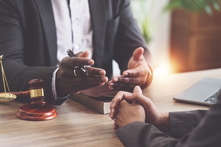 client consulting with a lawyer
