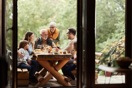 multi-generational family eating outside