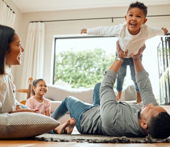 family playing in living room